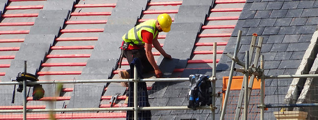 Professional roofing work in progress